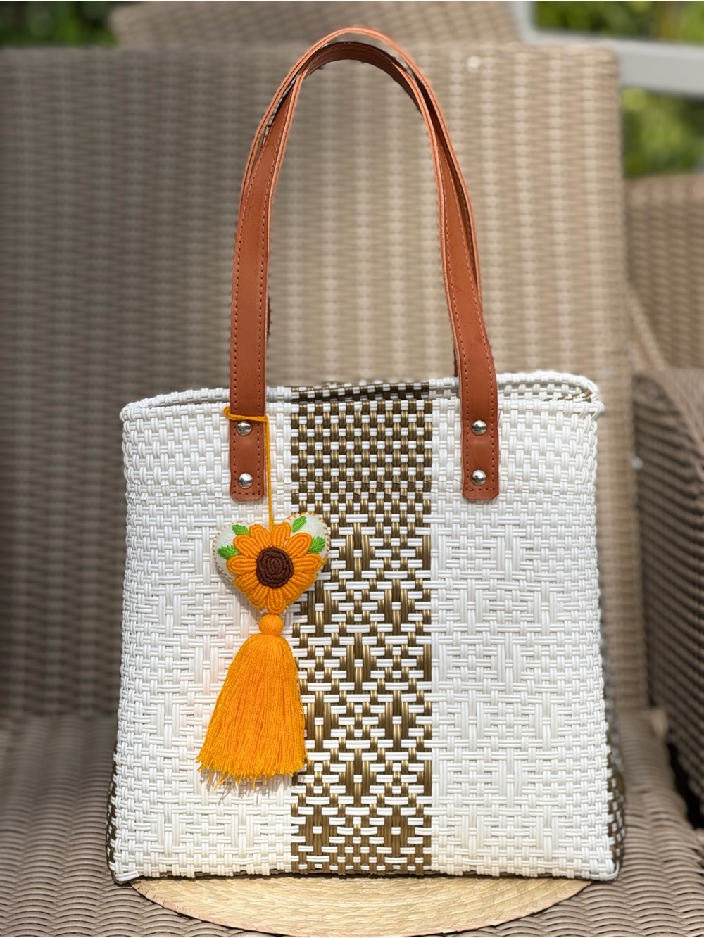 Woven White Tote Bag with Tan Handles and Yellow Tassel